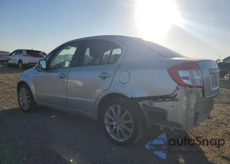 2011 Suzuki Sx4 Le z USA, uszkodzony, nr VIN JS2YC5A24B6301884